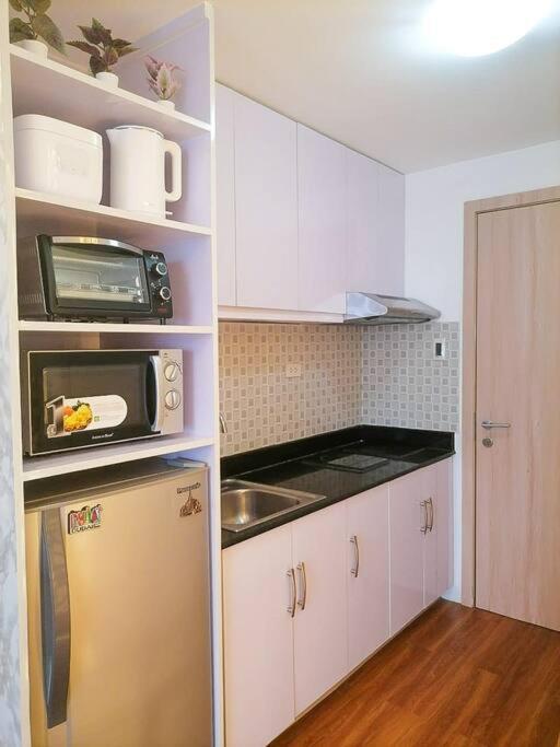 Cozy Studio Unit At Sun Residences Quezon City Exterior foto